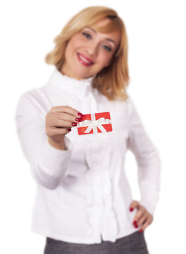 Woman holding gift card. Shopping, buying, paying concept.