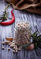 White dry beans in jar.