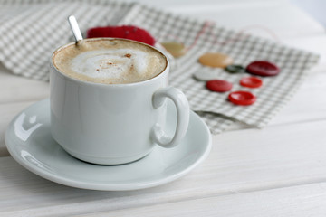 hot cappuccino excellent working break/hot cappuccino with milk foam and cinnamon