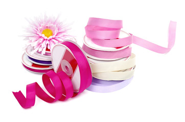 Romantic pink ribbons on white background