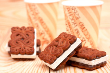 zephyr cookie with tea on wooden background