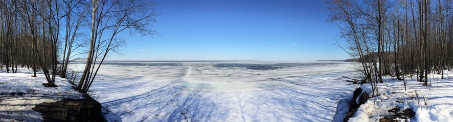winter river with blue sky