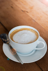 foam milk on hot latte coffee