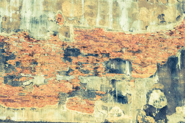 Old brick wall with cracked concrete pattern with color filter style