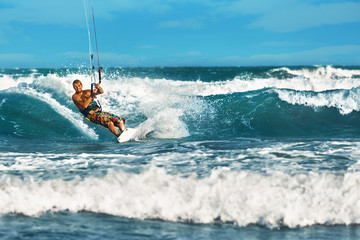Water Sports. Kiteboarding, Kitesurfing. Surfer Man Surfing On Waves In Ocean, Sea. Extreme Sport Action. Recreational Sporting Activity. Healthy Active Lifestyle. Summer Fun Adventure. Hobby