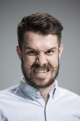 Fototapeta premium Close up face of angry man 
