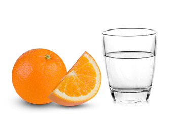 Glass of water with orange fruit