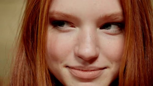 Beautiful redhead girl showing different emotions.