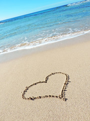 Heart drawing on the sand