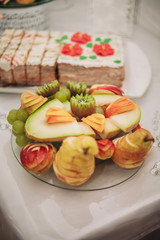 Various sweet sliced fruit on a buffet table