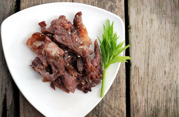 Roast pork with sesame on plate