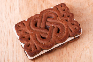 coockies with zephyr layer on wooden background