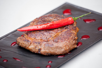 grilled steak with pepper