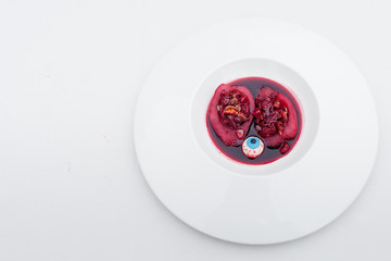 sliced stuffed pear in wine