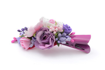 hairpin with flowers isolated on white