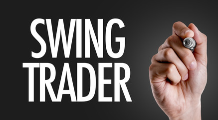 Hand writing the text: Swing Trader