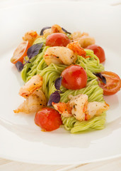 Pasta with shrimp, tomatoes and herbs