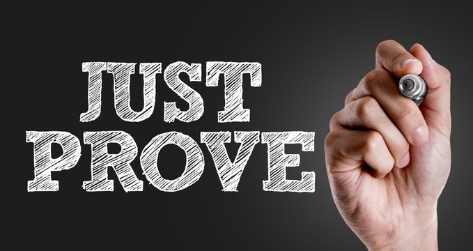 Hand writing the text: Just Prove