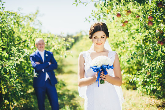 Bride in the apple garden