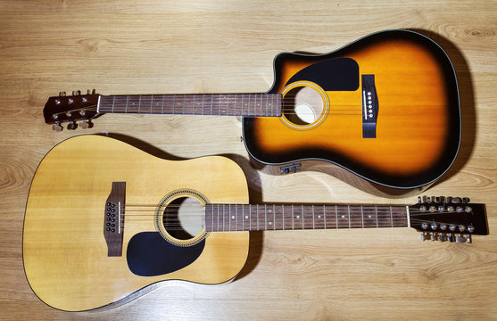 two acoustic guitars