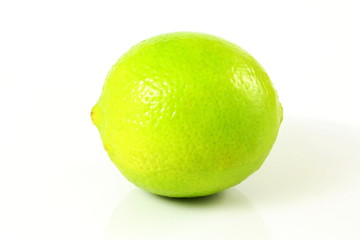 fresh lemon lime citrus fruit closeup in white background