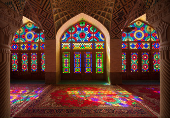 Fototapeta na wymiar Interior of Nasirolmolk Mosque in Shiraz with Colorful Stained Glass Windows