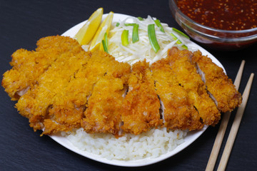 japanese deep fried pork cutlet or tonkatsu with sauce, Japanese cuisine food