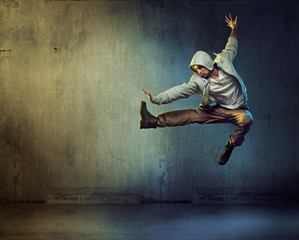 Athletic dancer in a jumping pose