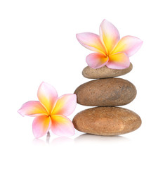 Obraz na płótnie Canvas zen stones with frangipani flower on white background