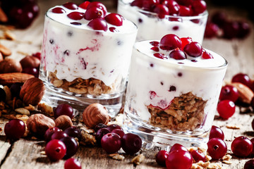 Healthy breakfast with baked wheat flakes, yogurt, cranberries a