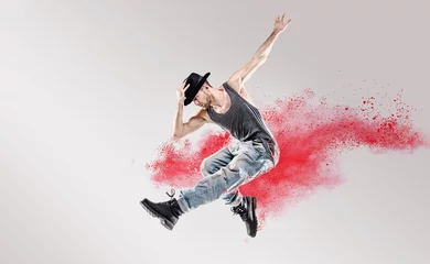 Gordijnen Conceptueel beeld van hiphopdanseres onder rood stof © konradbak