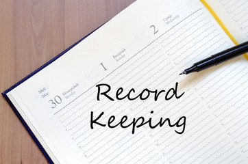 Record keeping write on notebook