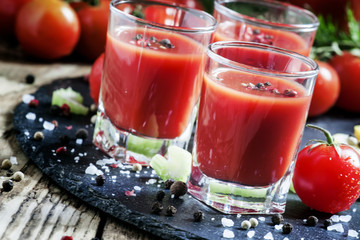 Tomato cocktail with tomatoes, lemon juice, celery, hot pepper a