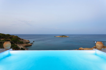 Naklejka premium big luxury pool in the afternoon