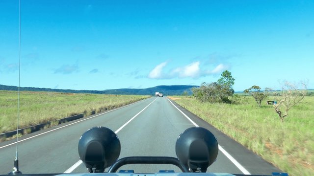 Off road vehicle driving on La Gran Sabana near San Ignacio de Yuruani main road, Venezuela