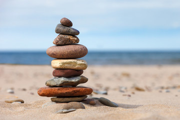 Fototapeta na wymiar concept of balance and harmony. rocks on the coast of the Sea in