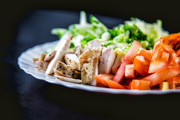 ingredients for the salad, meat, tomatoes carrots, tasty