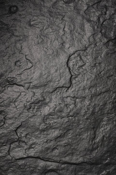 Black stone slab, background. View from above.