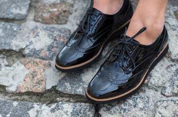 Close up of stylish female shoes.  Outdoor shoes advertising