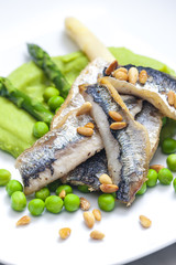 herring with green asparagus and peas