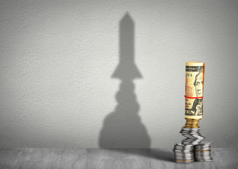 financial growth creative concept, money with rocket shadow