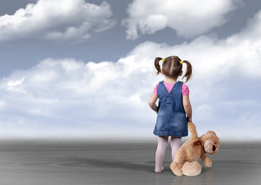 Child Girl With Toy Bear Looking Into The Distance, Perception C