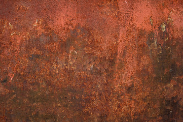 Red painted metal with rust texture background
