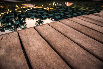 wooden pool terrace in evening time