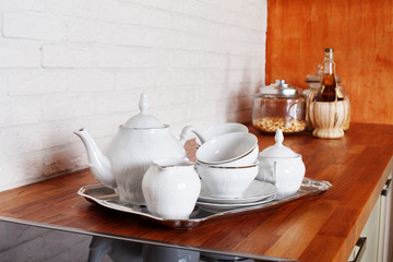 Fototapeta na wymiar ware tea cup set metal service silver tray interior home kitchen a beautiful Provence style porcelain