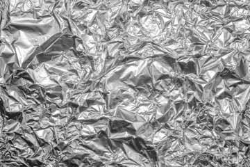 Crumpled silver aluminum foil. View from above.
