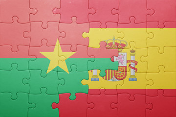 puzzle with the national flag of spain and burkina faso