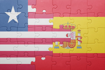 puzzle with the national flag of spain and liberia