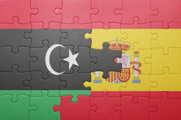 puzzle with the national flag of spain and libya
