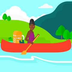 Woman canoeing on the river.